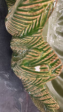 Damaged NAPA Home & Garden Winslow Decorative Bowl in green - close-up of glaze chip